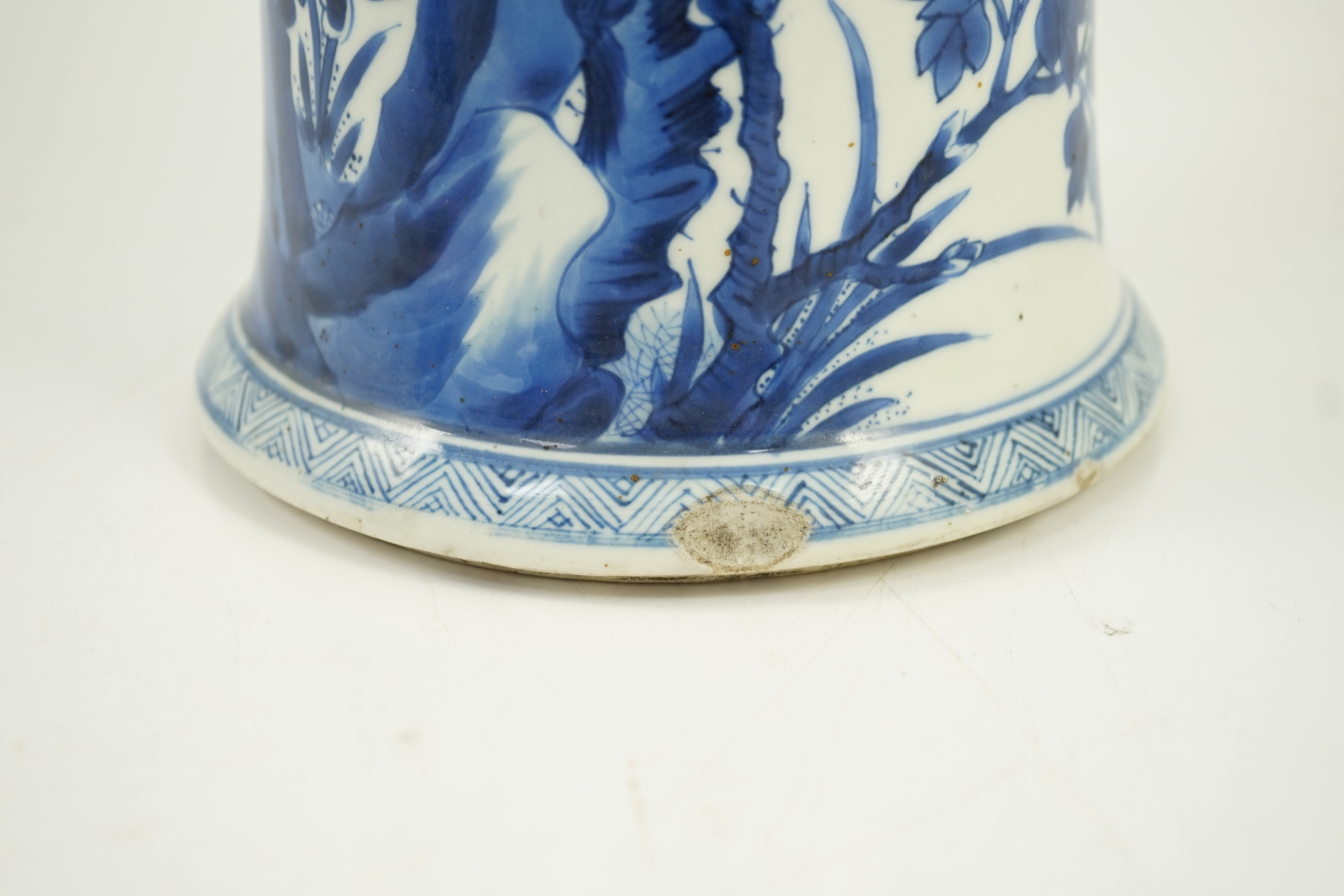 A tall Chinese blue and white ‘pheasants and rocks’ beaker vase, gu, Kangxi period, minor faults